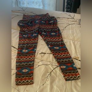 Colorful aztec tribal leggings. Size S/M. Fabric is smooth and comfy.